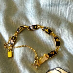 Elegant Gold and Black Bracelet